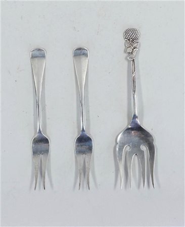 A lot of three pickle forks, H Hooikaas and Zilverfabriek Voorschoten. 115...