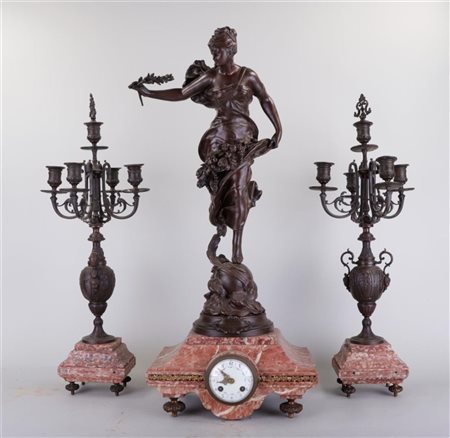 A mantel clock, with a bronze bell figure representing 'Paix et Aboundance'...