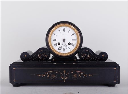 A black marble mantel clock with enamel dial. France, late 19th century.33 x...