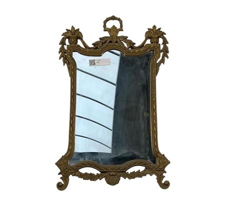 A bronzed, English, facet cut mirror.H. 74 x 44 cm.