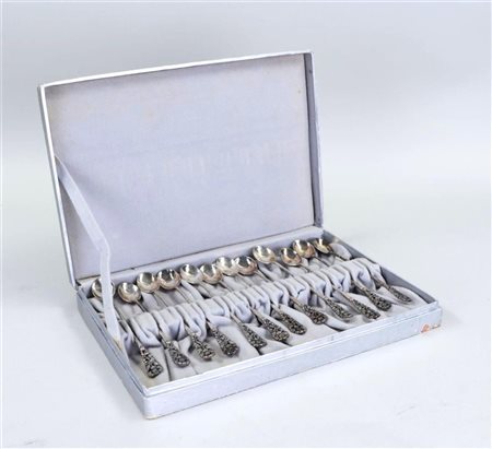 A set of twelve Djokja silver ice cream spoons in original casette. 275 grams.