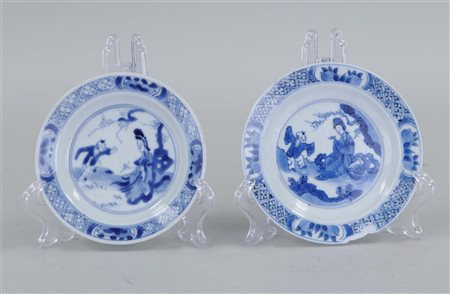 A set of two porcelain plates decorated with figures. China, Kangxi. One...