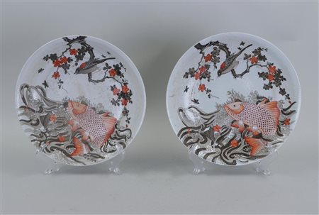 A set of two porcelain dishes decorated with carp and birds, marked Guanxu....