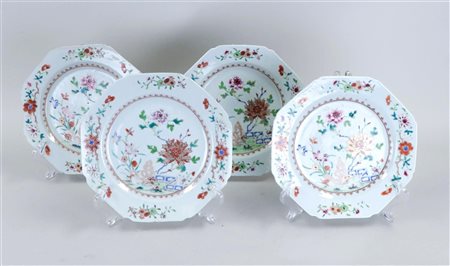 A set of four famile rose plates decorated with flowers and plants. China,...