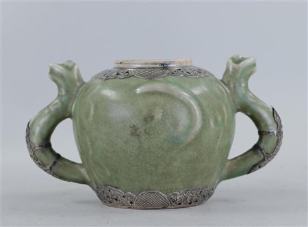 A green celadon jar with serpent ears, set with silver. China, 18th...