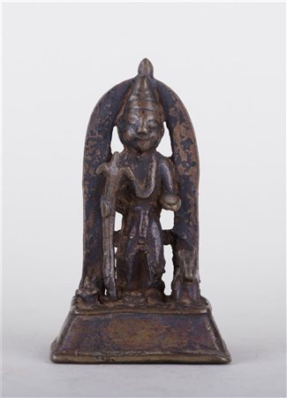 A bronze figure with animal. India, 19th century.13 x 7 cm.