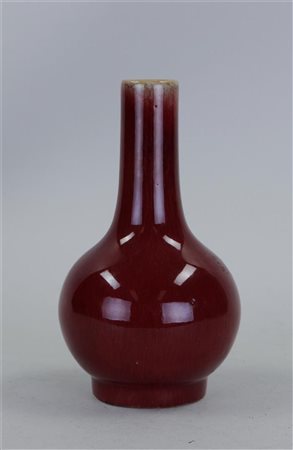 A sang de boeuf pipe vase. China, 19/20th century.H. 17 cm.