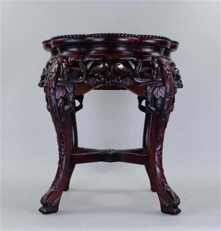 A Chinese console table with marble top. China 20th century.