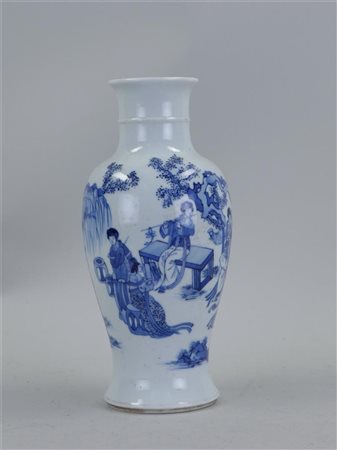 A porcelain baluster vase decorated with figures in a garden. China,...