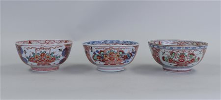 Three porcelain bowls with landscape and flower basket decoration, Chinese...