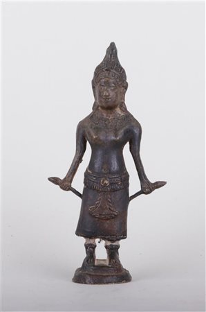 A cast bronze statuette of the goddess Uma, standing in samabhanga posture....