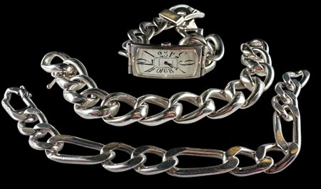 Lot consisting of a solid silver oval link bracelet with chapter closure, a...