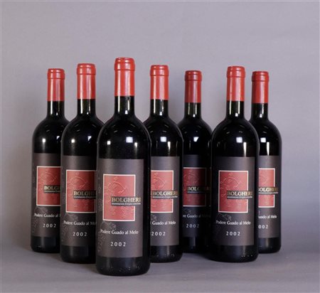 8x 0.75 liter Podere Guado al Melo Bolgheri 2002.