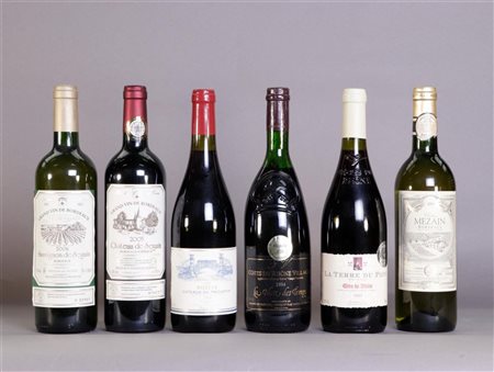 A collection of six diverse red French wines.