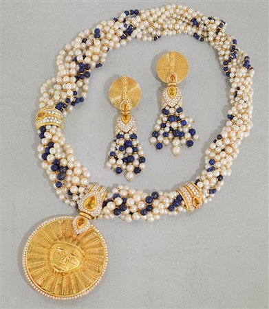 PARURE DEMI PARURE. In oro giallo 18 kt composta da coppia di orecchini a...