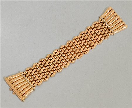 BRACCIALE BRACCIALE ANNI '40 CA. In oro giallo 18 kt con motivi terminali a...