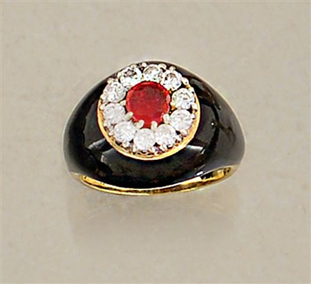 ANELLO ANELLO. In oro giallo e bianco 18 kt con rubino taglio rotondo di cts....