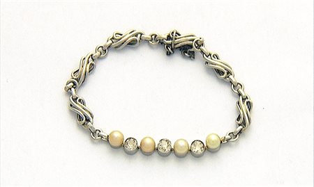 BRACCIALE BRACCIALE ANNI '30 CA. In oro bianco 18 kt maglia a volute con...