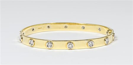 BRACCIALE RIGIDO IN ORO E DIAMANTI realizzato in oro giallo e oro bianco,...