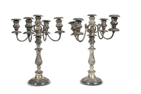 COPPIA DI CANDELABRI H cm 42 In Silver plate, XIX secolo, a cinque luci,...