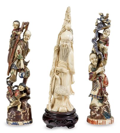 LOTTO DI TRE STATUINE IN AVORIO H. cm 26 Lotto composto da tre statuine in...