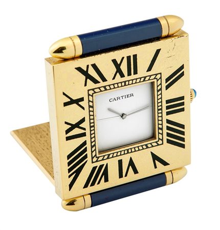 CARTIER Pendola da viaggio, anni '90, Cm 5x5 Cassa in ottone dorato e smalto...