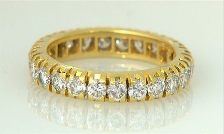 ANELLO ANELLO ETERNEL. In oro giallo 18 kt montatura rigida interamente in...