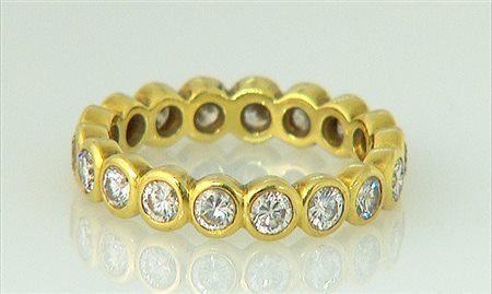 ANELLO ANELLO ETERNEL. In oro giallo 18 kt montatura rigida interamente in...