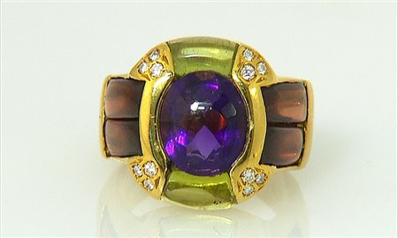 ANELLO ANELLO. In oro giallo 18 kt con gemme multicolor taglio fantasia...