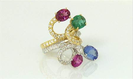 ANELLO ANELLO. In oro bianco e giallo 18 kt sommità stilizzata con tanzanite...