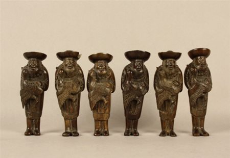 Lotto composto da sei netsuke in legno raff. ''PERSONAGGI''. Firmati sul...