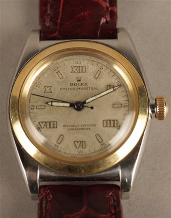 ROLEX Oyster Perpetual, ''Ovetto'', anni '40, acciaio e oro, quadrante...