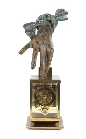 COSTANTINO MONGINI Milano 1918 - 1981 "Mano con orologio", scultura multiplo...