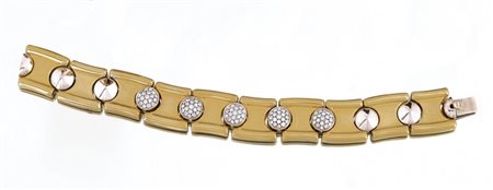 BRACCIALE BRACCIALE. In oro giallo e bianco 18 kt maglie scatolate alternate...