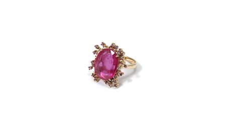 ANELLO IN ORO ROSA, CORINDONE VARIANTE RUBINO, DIAMANTI E GRANATI RODOLITE...