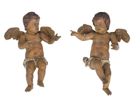 SCULTORE DEL XIX SECOLO Coppia di putti Legno scolpito e dipinto, alt cm 54 e...