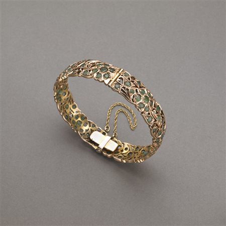 Bracciale rigido in oro rosso con smeraldi rotondi, g.31,40 Red gold and...