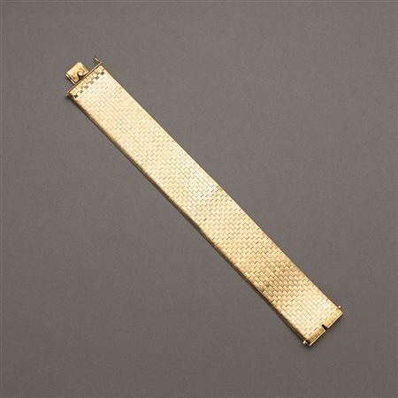 Bracciale in oro giallo a lavorazione lucida, alt. 2,50cm, lungh. 20cm,...