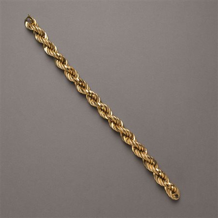 Bracciale torchon in oro giallo zigrinato e lucido, lungh. cm 21,50, g.27,40...