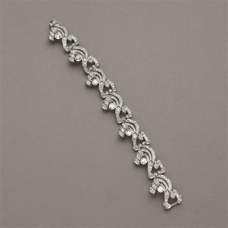 Bracciale d'epoca in platino a sette moduli con diamanti rotondi taglio a...