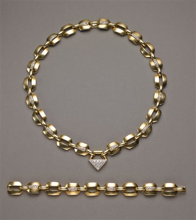 Demi-parure in oro giallo e bianco: bracciale e collier unibili con...