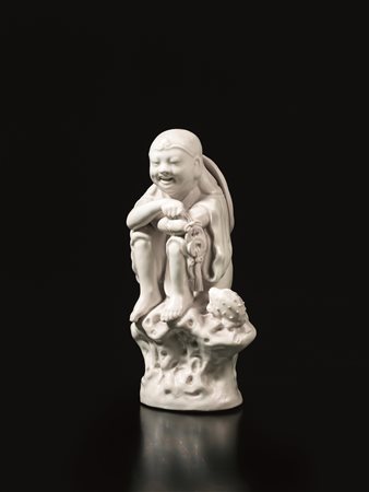 SCULTURA CINA SEC. XIX -XX in porcellana Blanc de Chine raffigurante bambino...