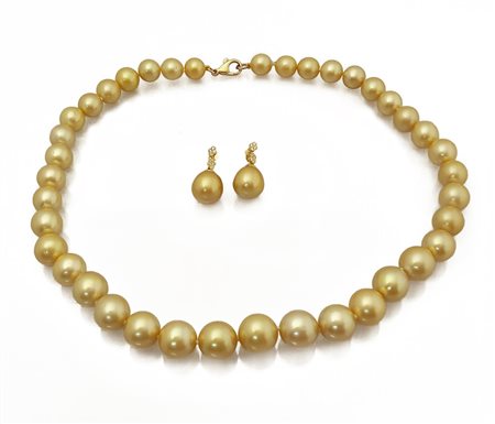 PARURE DEMI PARURE. In oro giallo 14 kt, composta da collana ad un filo di...