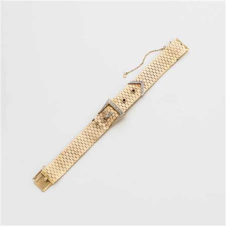 Bracciale in oro rosso e bianco a guisa di fibbia con diamanti rotondi,...