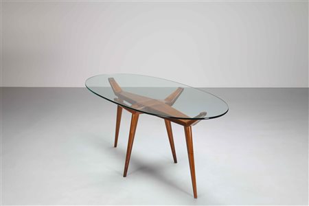 GIORDANI PIERLUIGI Tavolo. 1954. Legno di noce e vetro. Cm 180,00 x 77,50 x...