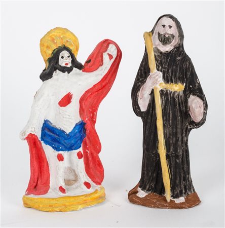 DUE FISCHIETTI in ceramica decorata raffigurante "Cristo" e "Santo". XX...