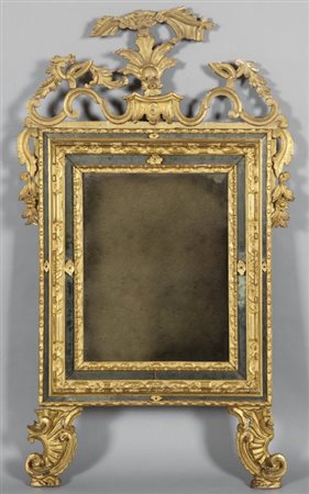 Specchiera Luigi XIV in legno finemente intagliato e dorato con...