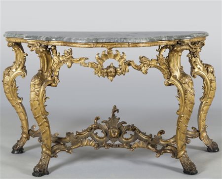 Console Luigi XV in legno finemente intagliato e dorato, gambe mosse...