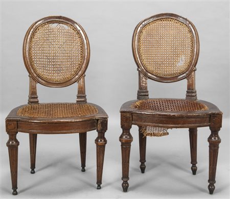 Coppia di piccole sedie ovaline Luigi XVI in noce con cannè, Genova fine sec....