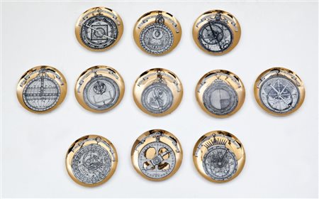 PIERO FORNASETTI Una serie di 11 piatti della serie "Astrolabio", anni '60....